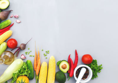 High angle view of chopped fruits and vegetables on table