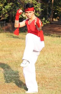 Woman standing on field