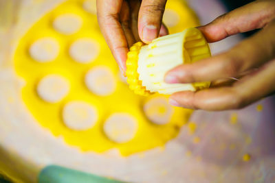 Close-up of person preparing food