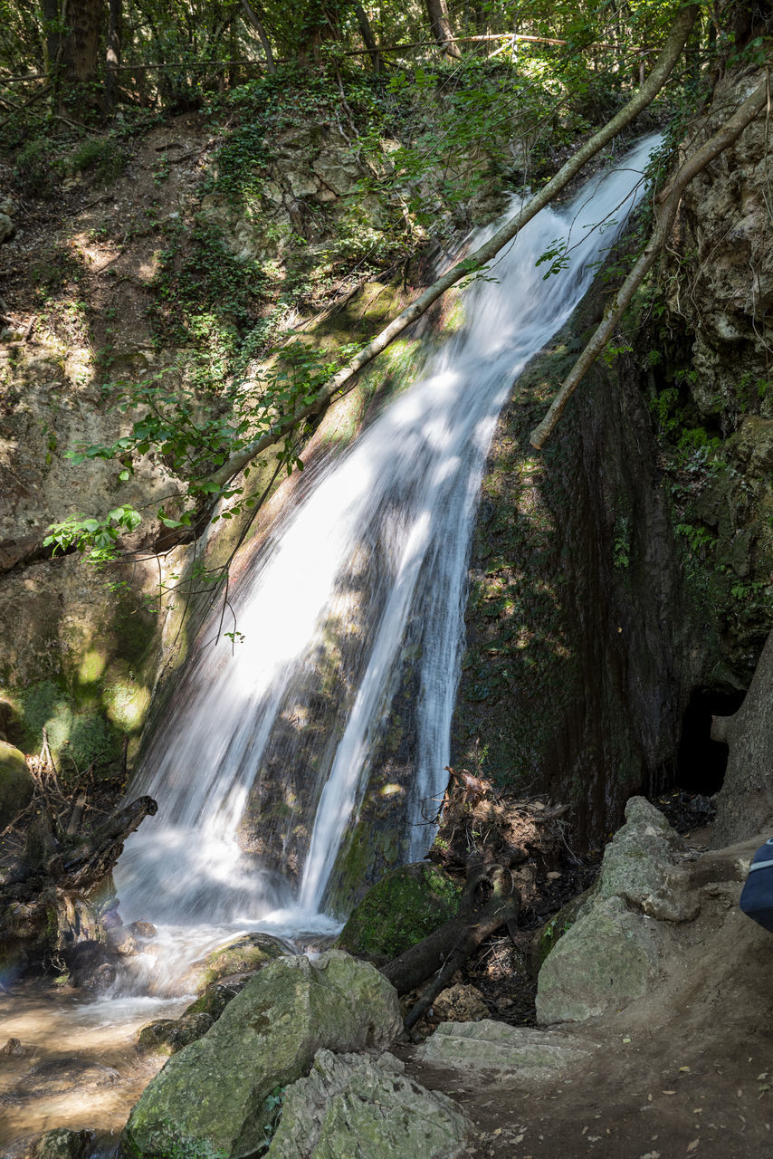 waterfall, beauty in nature, water, scenics - nature, forest, tree, nature, body of water, land, plant, motion, environment, rock, flowing water, stream, long exposure, watercourse, water feature, non-urban scene, river, flowing, outdoors, no people, blurred motion, day, travel destinations, autumn, landscape, idyllic, travel, rainforest, tranquil scene, sports, moss, tranquility, tourism, growth, rock formation, green