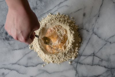 High angle view of person preparing food