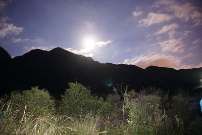 Scenic view of mountains against sky during sunset