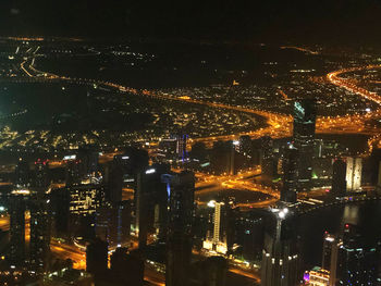 High angle view of illuminated city at night