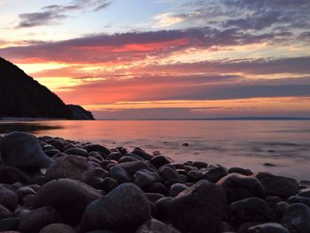 Scenic view of sea at sunset