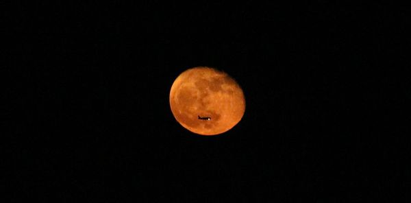 Scenic view of moon against sky at night