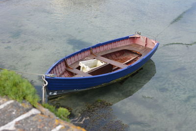 High angle view of boat moored in water