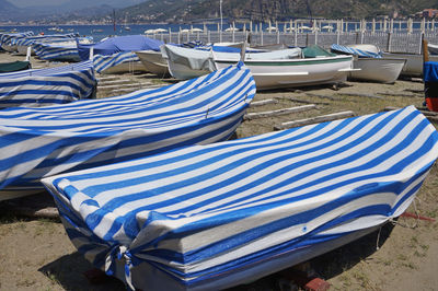 Boats moored at beach