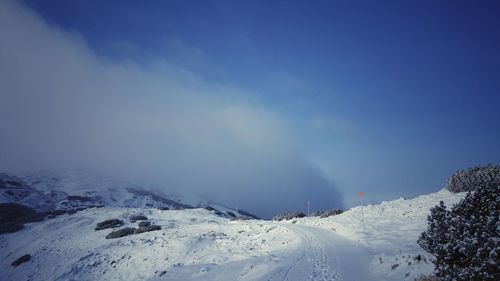 Scenic view of snow covered landscape