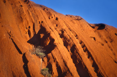 Rock formations in desert against sky