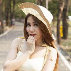 Young woman standing at park