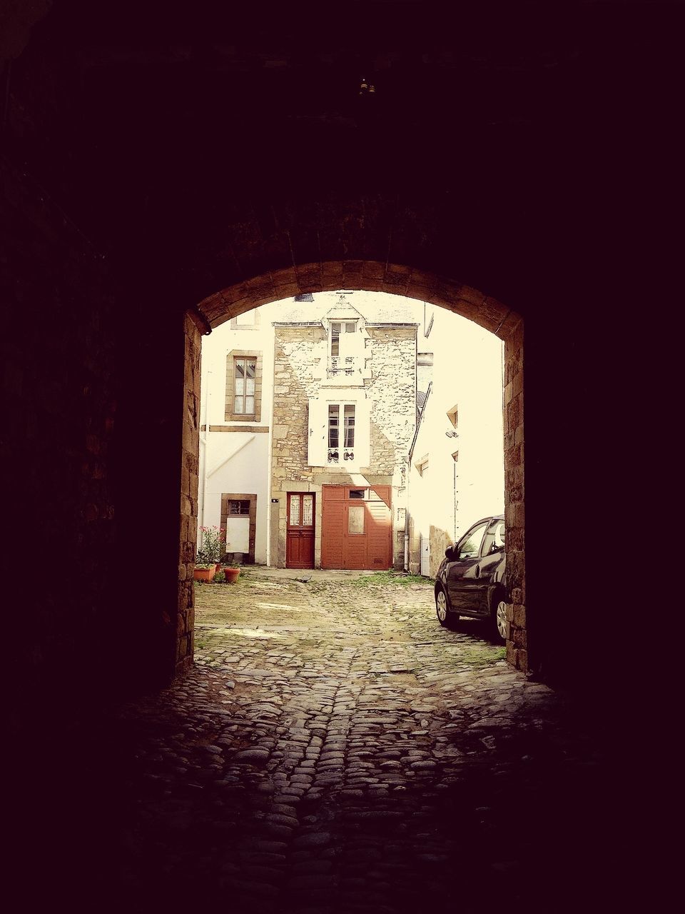 architecture, built structure, building exterior, window, the way forward, house, door, arch, wall - building feature, building, wall, street, empty, residential structure, entrance, narrow, residential building, indoors, cobblestone, no people