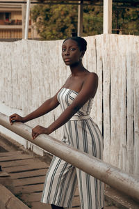 Young woman standing outdoors