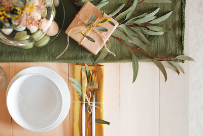 High angle view of easter table decoration with copy space