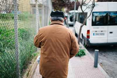 Rear view of a man in city