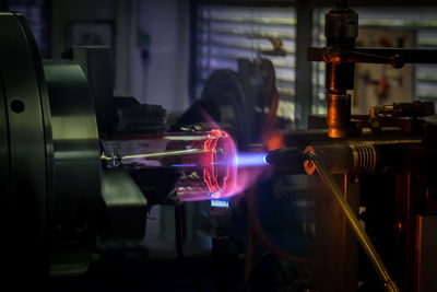 Close-up of welding torch in factory