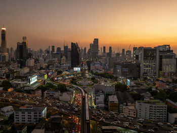 High angle view of cityscape against sky during sunset