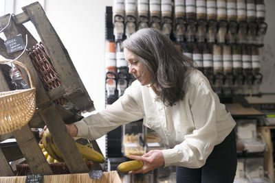 Woman working in organic shop