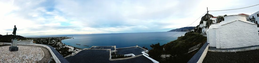 Panoramic view of sea against cloudy sky