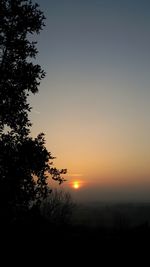 Scenic view of sea against sky at sunset