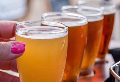 Close-up of beer glass on table