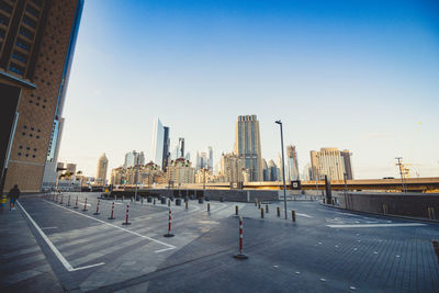 Panoramic view of city buildings against clear sky