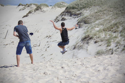 Woman jumping at night