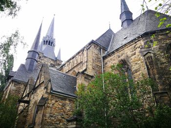 Low angle view of old building against sky