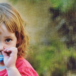 Little girl looking at camera