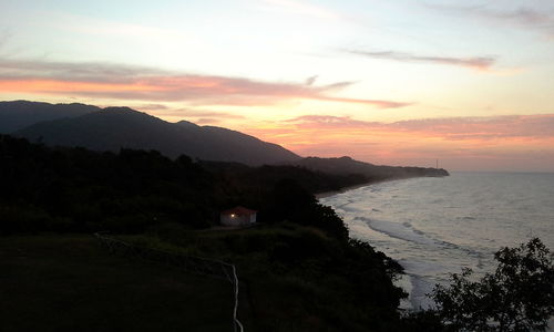 Scenic view of sea against sky during sunset