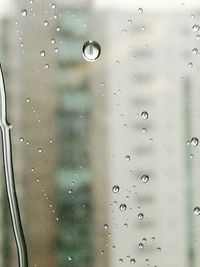 Close-up of water drops on glass