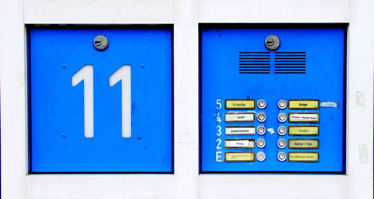 blue, communication, close-up, number, text, door, western script, safety, green color, metal, closed, control, security, mailbox, alphabet, wall - building feature, indoors, wall, sign, no people