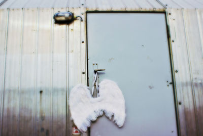 Close-up of white door