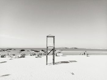 Scenic view of beach against clear sky