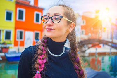 Portrait of young woman wearing sunglasses