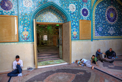 People at entrance of building