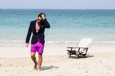 Man walking on beach