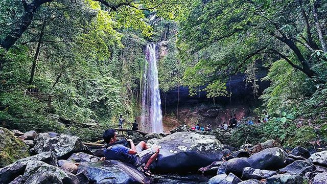 SCENIC VIEW OF WATERFALL