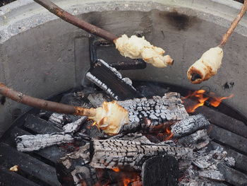 High angle view of meat on barbecue grill