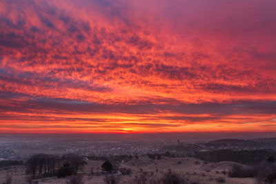 Scenic view of dramatic sky during sunset