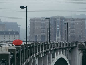 Buildings in city against sky