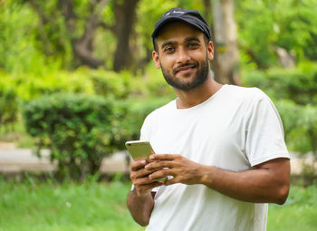 Young man using mobile phone