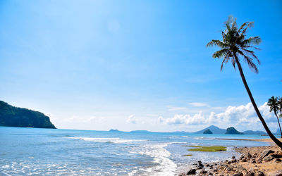 Scenic view of sea against blue sky