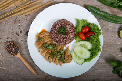 High angle view of breakfast served on table