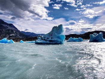 Scenic view of frozen sea against sky