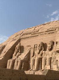 Low angle view of sculpture against sky