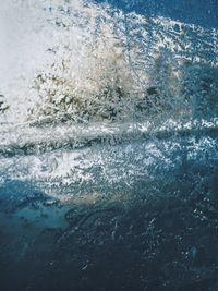 High angle view of waves in sea