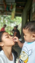 Cute siblings playing at home