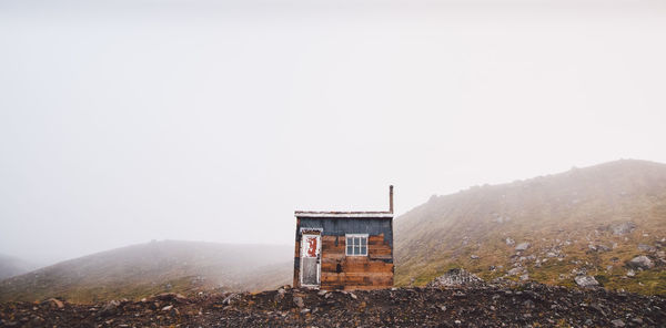 Built structure on land by building against clear sky