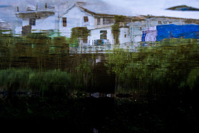 Reflection of buildings in lake