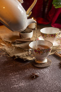 Close-up of tea cup on table